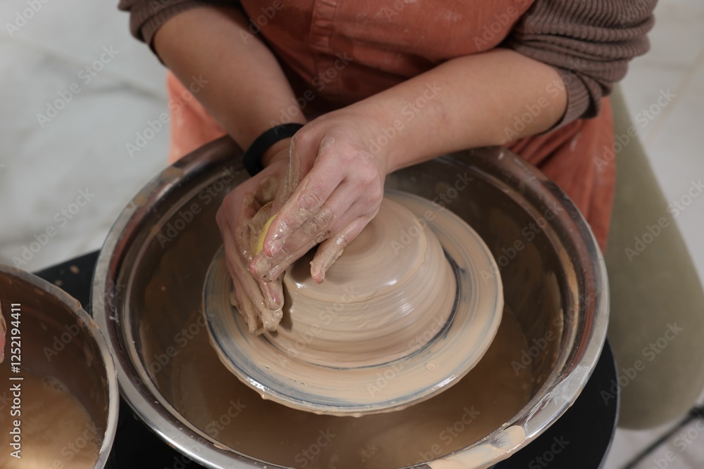 Hobby and craft. Woman making pottery indoors, closeup Hobby and craft. Woman making pottery indoors, closeup