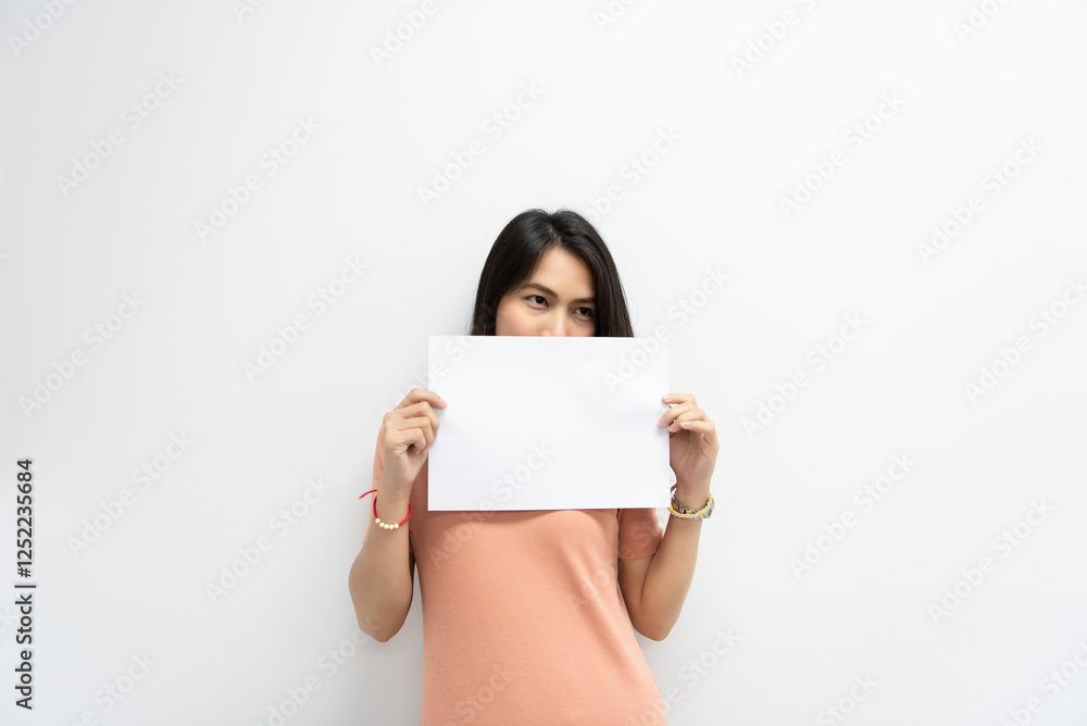 Woman showing blank white paper for copy space Woman showing blank white paper for copy space