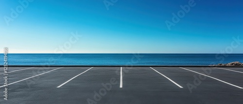 A serene ocean view from an empty parking lot.