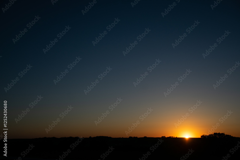 Sun setting in the distance Sun setting in the distance