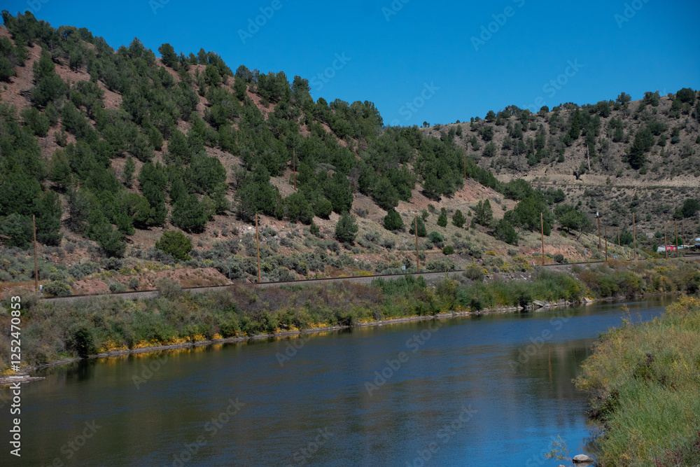 river cutting through rural Colorado river cutting through rural Colorado