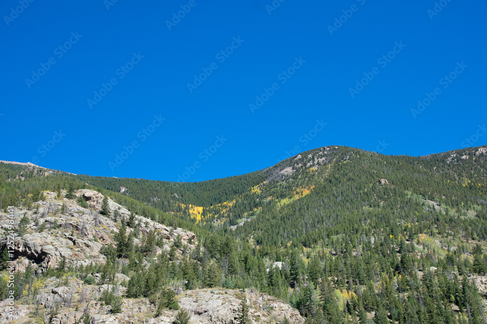 clear blue skies and Colorado mountainsides clear blue skies and Colorado mountainsides