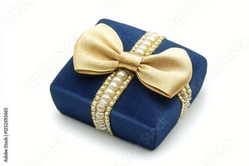 Gift wrapped in light blue paper with golden bow and stars scattered on white...