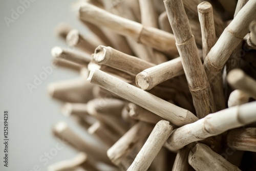 Creative wooden decor piece made from twigs arranged in an artistic manner in...