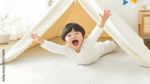 Joyful Toddler in Play Tent...