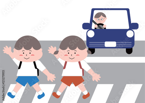 横断歩道を渡る子供と一時停止する車