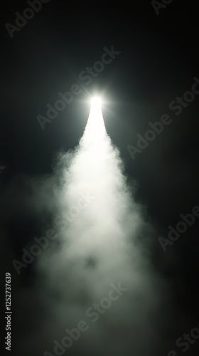 Dramatic light beams cutting through fog in a dimly lit space during an eveni...