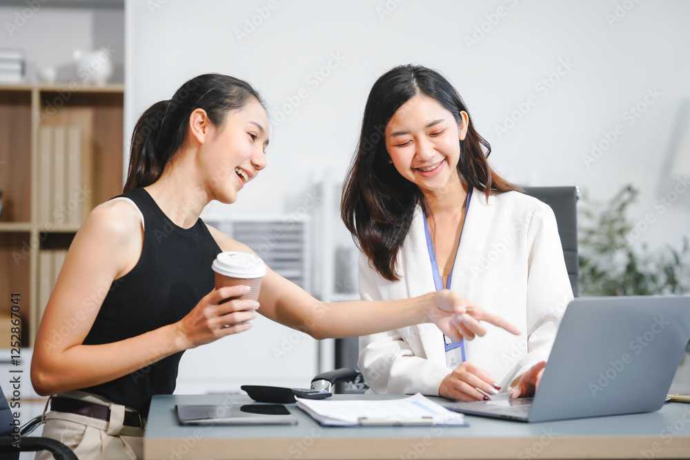 Two Asian female business woman sit desk,discussing business investments.They analyze financial data, explore market opportunities, and strategic growth to maximize returns ensure business success Two Asian female business woman sit desk,discussing business investments.They analyze financial data, explore market opportunities, and strategic growth to maximize returns ensure business success