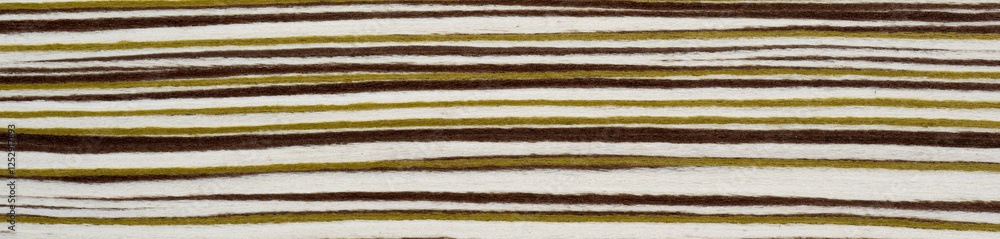 Country stripes in earthy tones march across this textured veneer surface Country stripes in earthy tones march across this textured veneer surface
