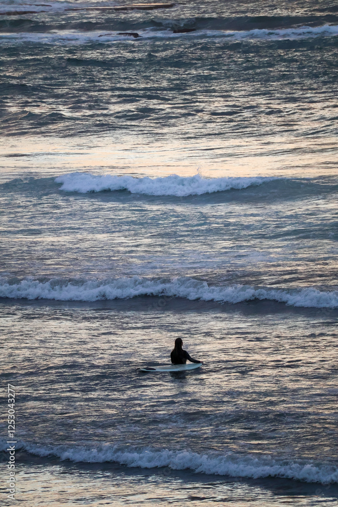 Fototapeta premium surfer at sunset