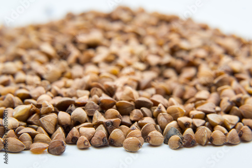 Buckwheat, dry grains, healthy food.
