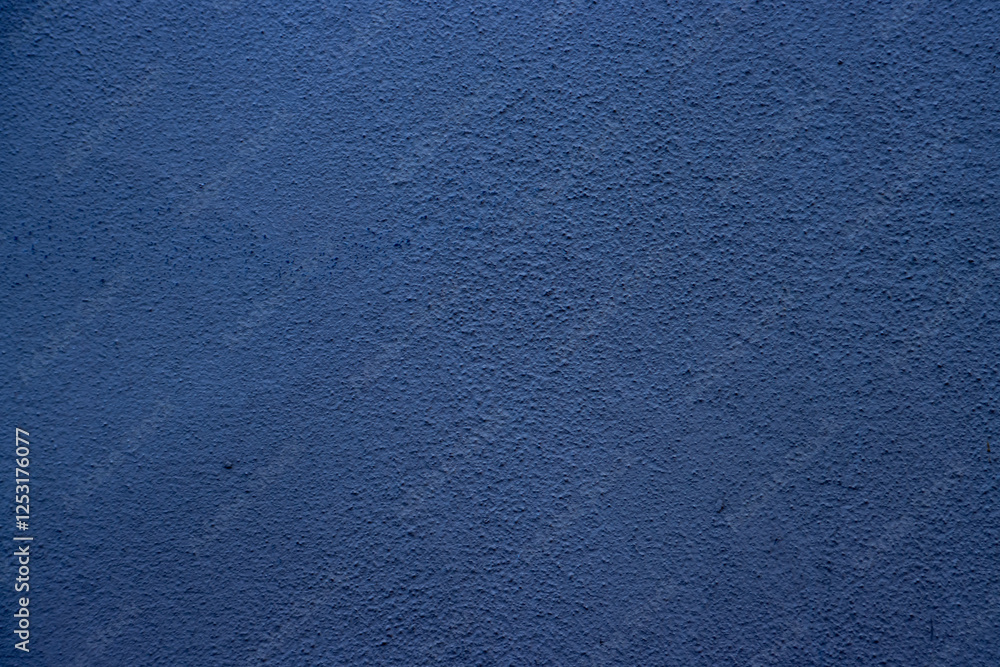 Blue colored abstract wall background texture with different shades of blue Blue colored abstract wall background texture with different shades of blue