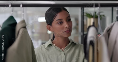 Woman, shopping and search with clothing rack at store for discount, deal and promotion for fashion at mall. Girl, person and customer experience with check for price, sale and bargain at boutique