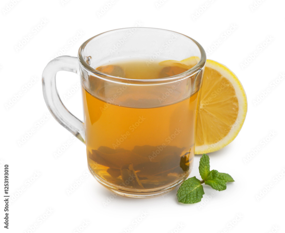 Aromatic mint tea with lemon, fresh and dried leaves isolated on white Aromatic mint tea with lemon, fresh and dried leaves isolated on white