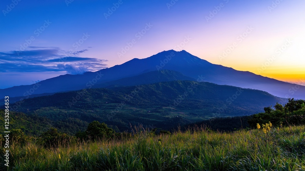 Majestic mountain range view at dusk, with a stunning purple and orange gradient sky Majestic mountain range view at dusk, with a stunning purple and orange gradient sky