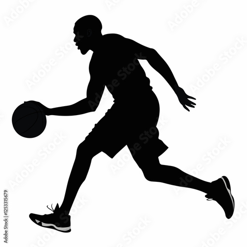 Silhouette of a basketball player dribbling the ball during a fast break