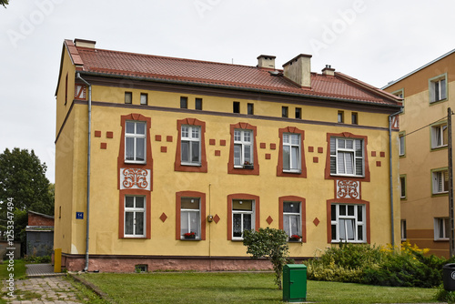 An old pre-war tenement house at Wojska Polskiego Street in Barczewo, Poland photo