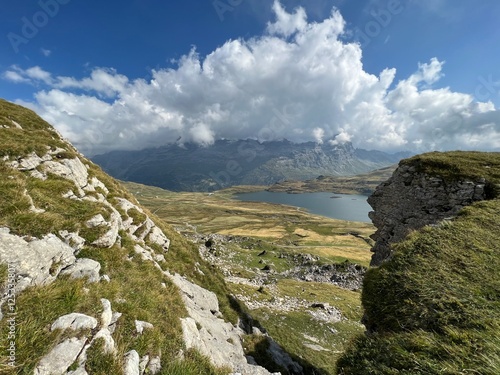 The alpine lake Tannensee or Tannen Lake in the Uri Alps mountain massif, Kerns - Canton of Obwalden, Switzerland (Kanton Obwald, Schweiz) photo