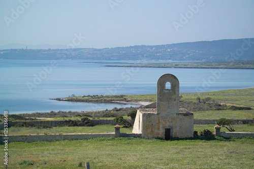 old stone church, Ruins of the small church of Fornelli. Asinara Island National Park. P.to Torres. Sassari, Sardinia. Italy photo