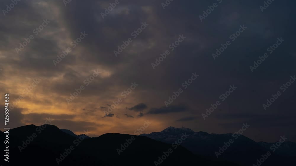 Timelapse of stunning textured sky in the mountains on the seashore Timelapse of stunning textured sky in the mountains on the seashore