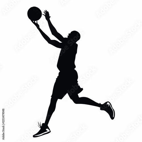 Silhouette of a basketball player making a jump shot during a game