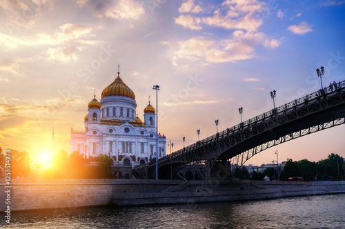 Moscow Russia landmark. Moscow sunset view of Moscow architecture landscape - Cathedral of Christ the Saviour and Patriarshy bridge in sunset in Moscow, Russia