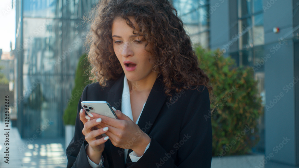 Excited happy surprised Caucasian girl business woman celebrate euphoric news amazing receive message on mobile phone good news wonder shock successful businesswoman win victory shout kiss smartphone Excited happy surprised Caucasian girl business woman celebrate euphoric news amazing receive message on mobile phone good news wonder shock successful businesswoman win victory shout kiss smartphone