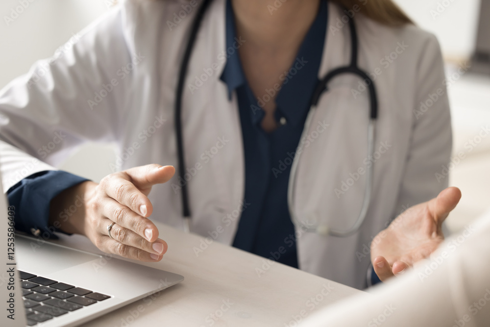 Obraz premium Communication with patient. Cropped close up young woman doctor in white coat see ill person at clinic office talk communicate explain diagnosis recommend treatment prescribe medication using notebook