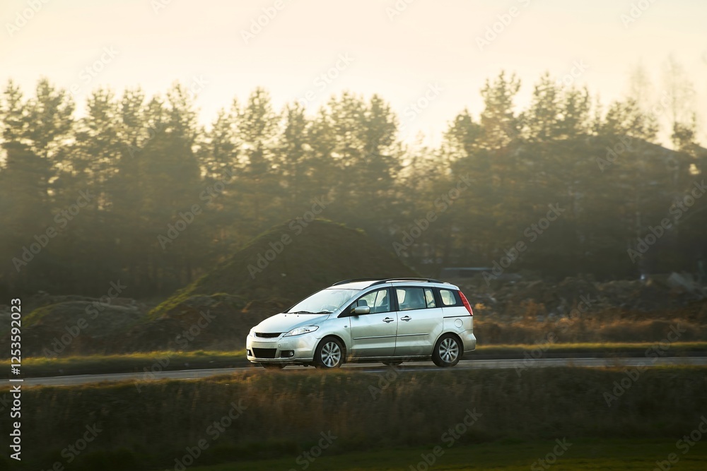 Fototapeta premium Modern passenger car in natural setting