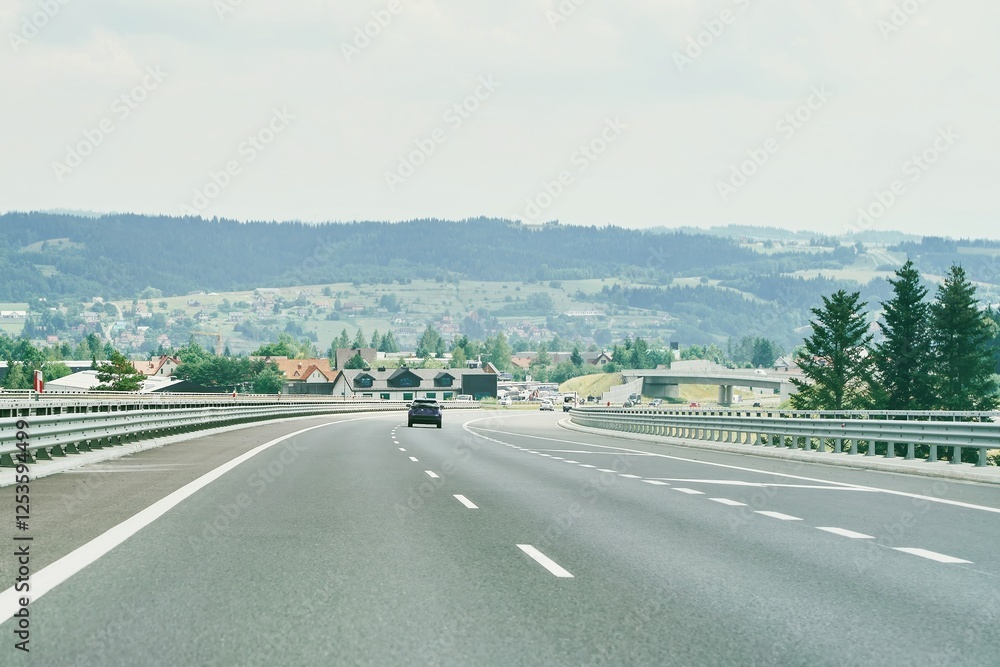 Fototapeta premium Scenic highway drive through rural landscape
