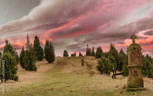 
atmospheric dawn on the historic Kalvarienberg in the Eifel photo