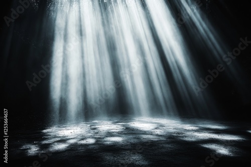 Light beams shining through smoke onto dark empty room with grunge floor
