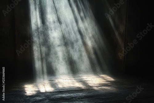Light beams shining through smoke onto dark empty room with grunge floor