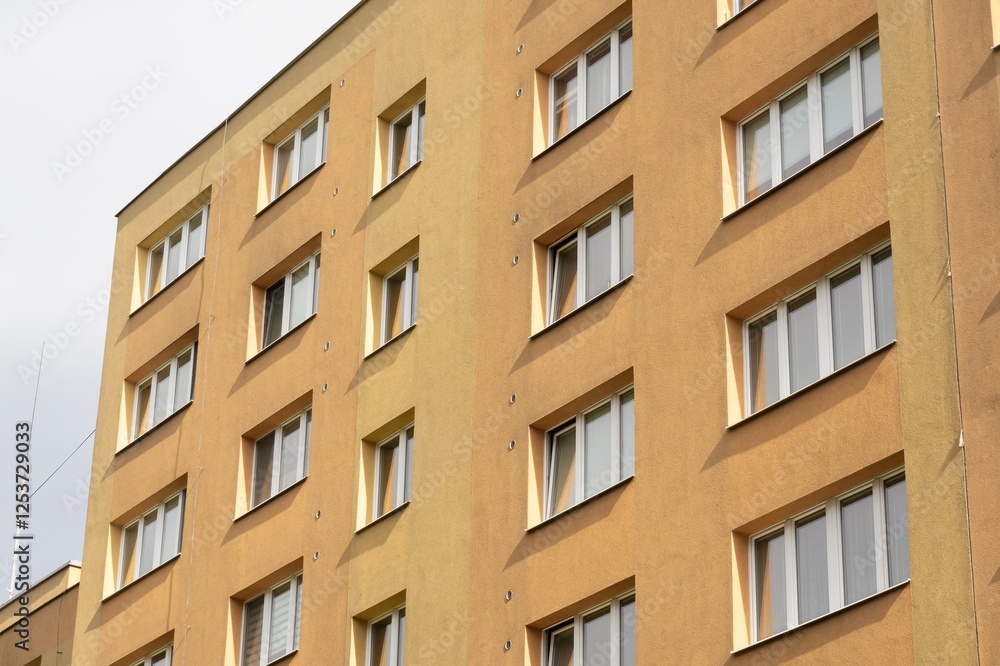Reconstructed facade on orange block of flats in Havirov