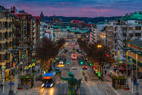 Gothenburg's Avenyn Boulevard at dusk with traffic and city lights creating a vibrant atmosphere
