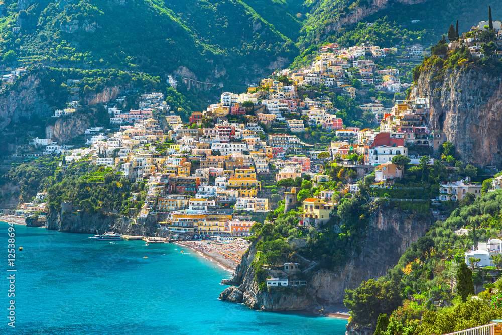 Morning view of Positano cityscape on coast line of mediterranean sea, Italy