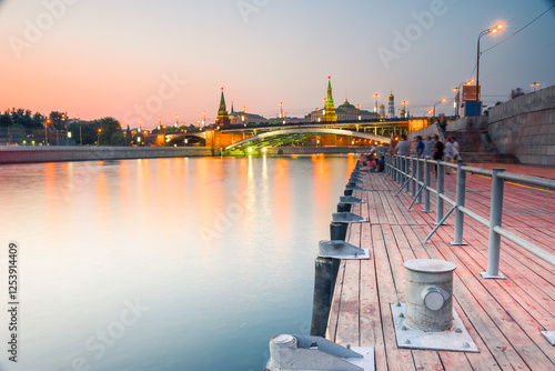 Picturesque evening view of the Moscow Kremlin from the Krasny Oktyabr pier on the Moskva River. Russia