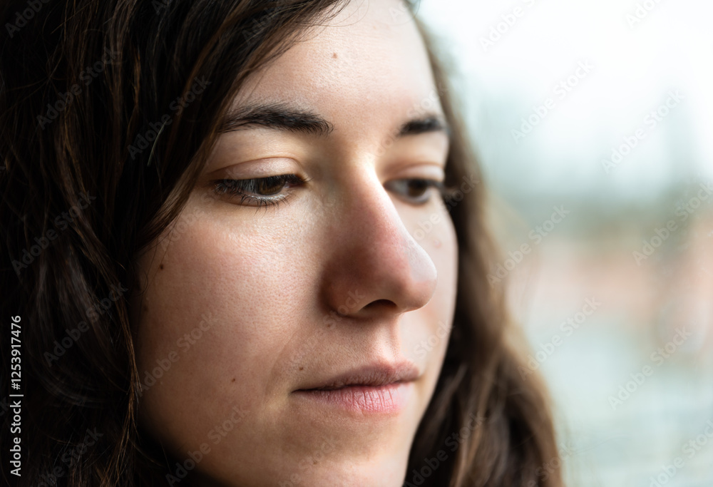 Fototapeta premium Indoor ortrait headshot of an attractive 27 yo white woman with brown hair