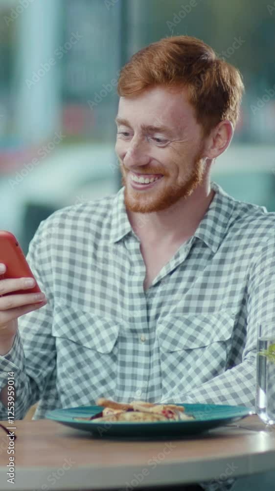 A man is lost in thought at a table, distracted by his phone A man is lost in thought at a table, distracted by his phone