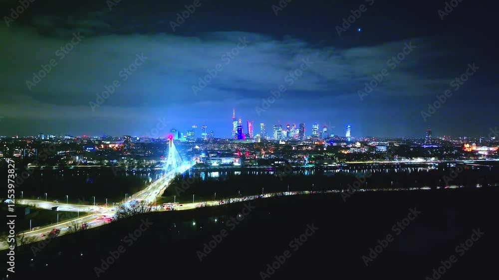A breathtaking night shot of Warsaw—Świętokrzyski Bridge, city skyline, and the streets full of life. A breathtaking night shot of Warsaw—Świętokrzyski Bridge, city skyline, and the streets full of life.