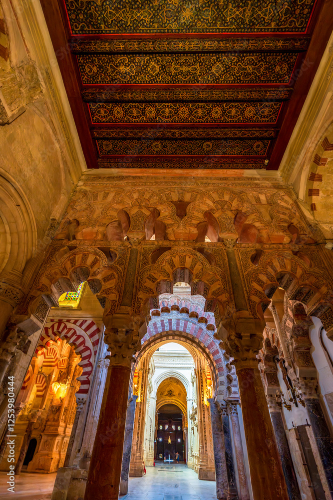 Obraz premium Great Mosque of Córdoba from the 8th Century featuring Moorish Arches, Umayyad Legacy, and a 13th Century Christian Conversion in Spain’s Andalusia