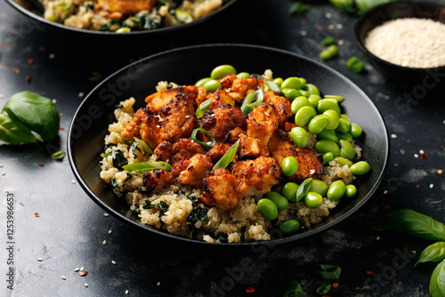 Sweet and sour tofu with spinach quinoa and steamed edamame beans. Healthy food. photo