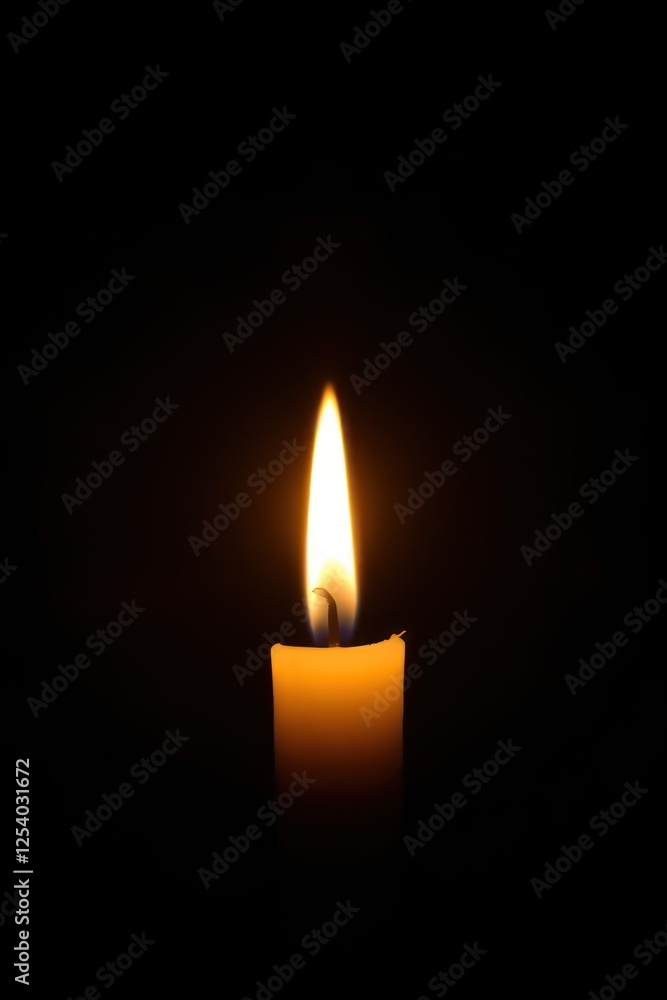 The warm light of a burning candle illuminates the darkness, representing hope and spirituality as it serves as a source of inspiration during sacred Christian occasions The warm light of a burning candle illuminates the darkness, representing hope and spirituality as it serves as a source of inspiration during sacred Christian occasions