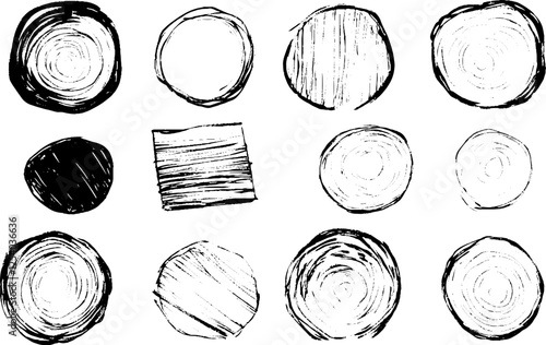 A collection of hand-drawn circular shapes in various styles, including solid black, textured, and empty circles. 