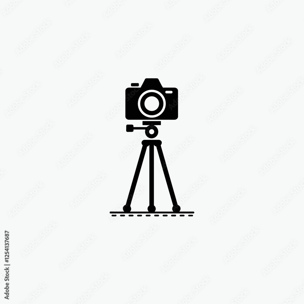 Camera on tripod against plain background, professional photography setup Camera on tripod against plain background, professional photography setup