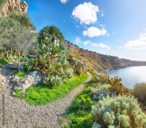 Stunning spring view on the the cape Milazzo panorama of nature reserve Piscina di Venere.