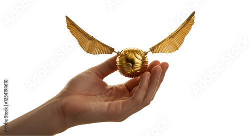 Wallpaper Mural Golden Ball with Wings: An Enchanting Capture of Magical Flight with Extended Wings of Wonder Torontodigital.ca