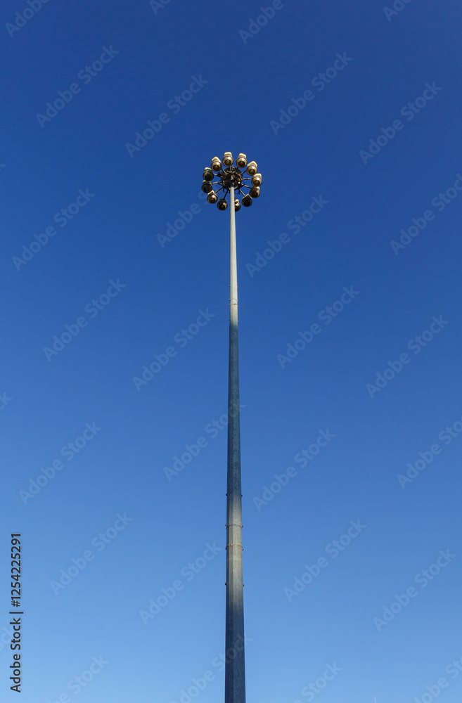 street lamp against blue sky