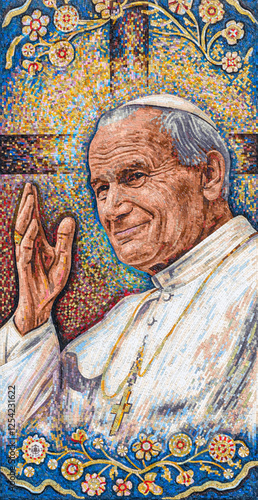 The mosaic of St John Paul II on the Bishop's Palace in Kraków, situated in the window frame from which he used to bless and address crowds.