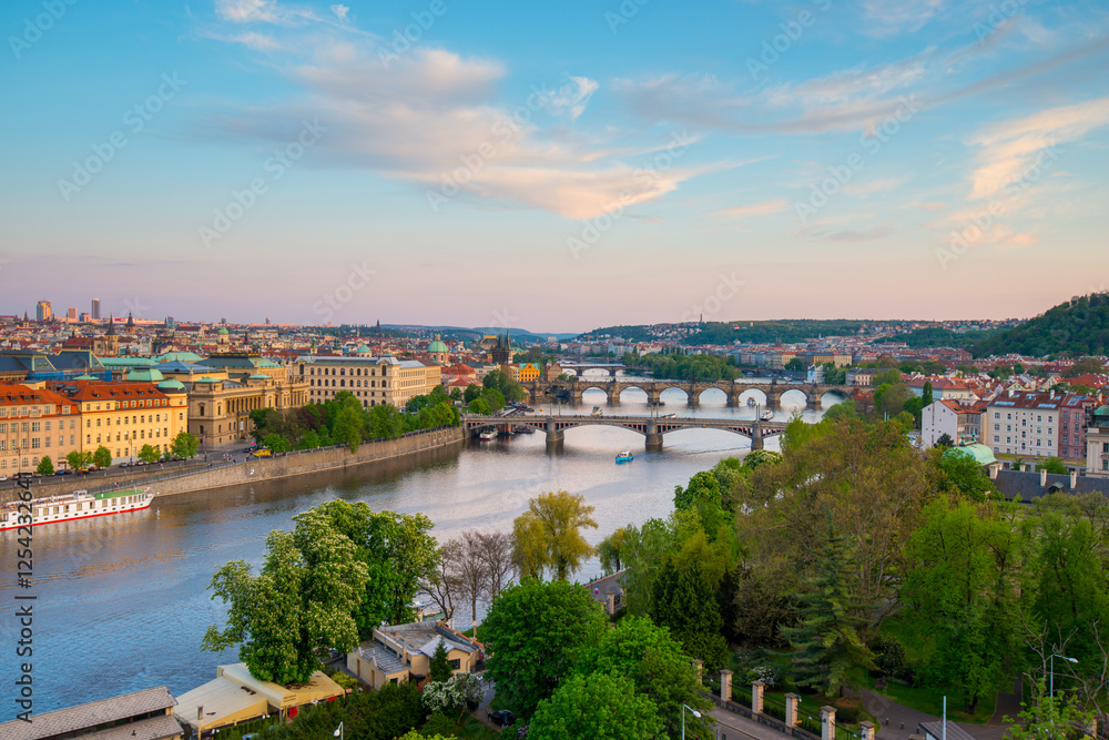 Fototapeta premium Beautiful view of Prague's riverside and bridges during sunset